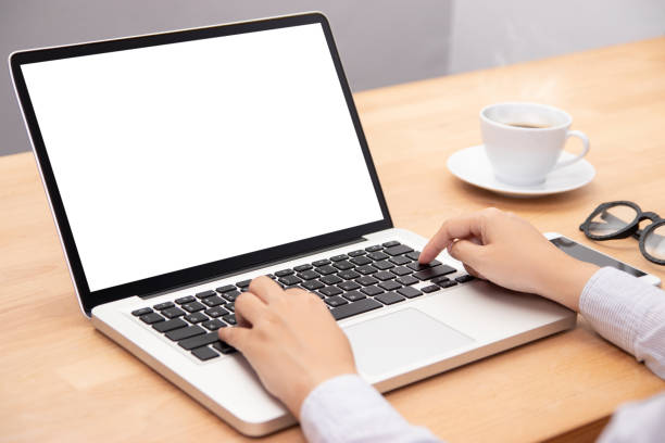 istock businesswoman working with notebook laptop computer, using finger with keyboard for typing. computer laptop with blank white screen for copy space 1158577495
