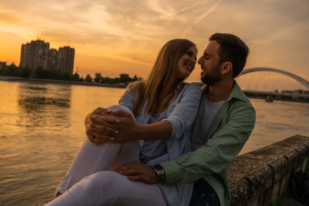 istock Loving couple in sunset 1158577528
