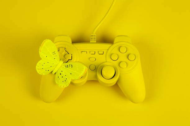istock play in yellow gradient with butterfly 1158578311
