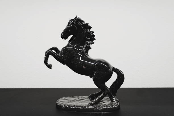 istock Porcelain Dark Horse Sculpture Statue isolated 1158578696