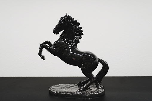 Porcelain Dark Horse Sculpture Statue isolated