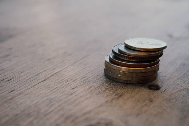 istock Counting Sorting Savings Money Coin Poverty 1158578900