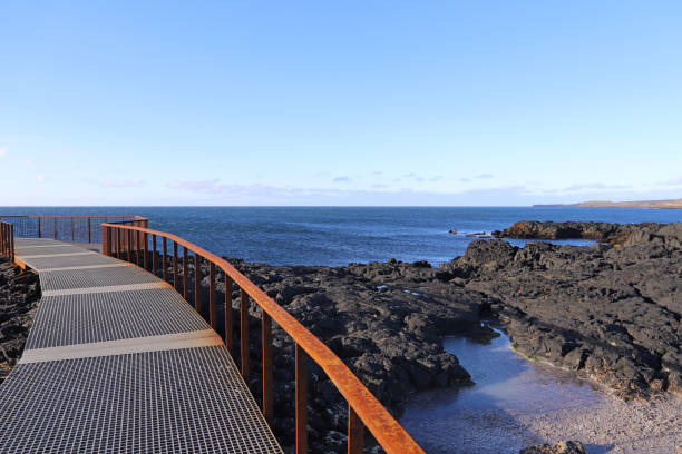 istock A footpath and viewing platform overlooking Brimketill lava rock pool. 1158578948