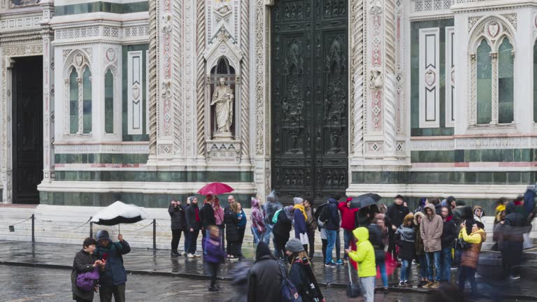 timelapse of tourist traveller walking and sigh seeing at Basilica of Santa Croce on Piazza di Santa Croce square, Florence, Tuscany, Italy, Europe