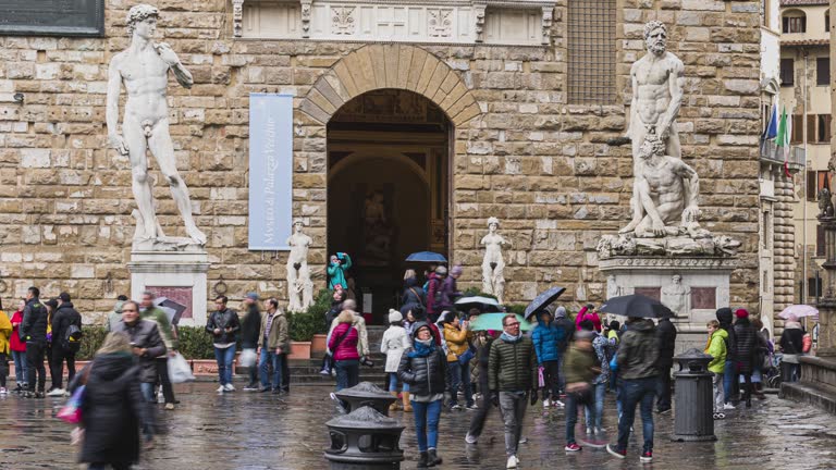 timelapse of tourist traveller walking and sigh seeing at Basilica of Santa Croce on Piazza di Santa Croce square, Florence, Tuscany, Italy, Europe