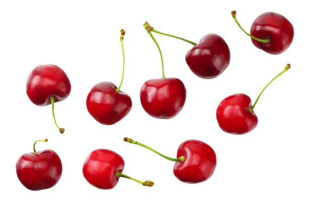 istock red cherry isolated on white background. Top view 1158583138