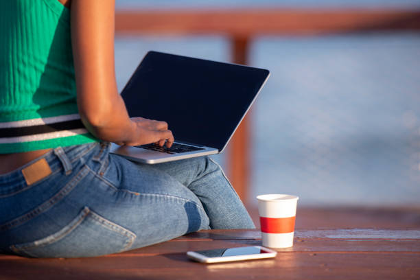 istock Close up freelancer working outdoors. 1158586583