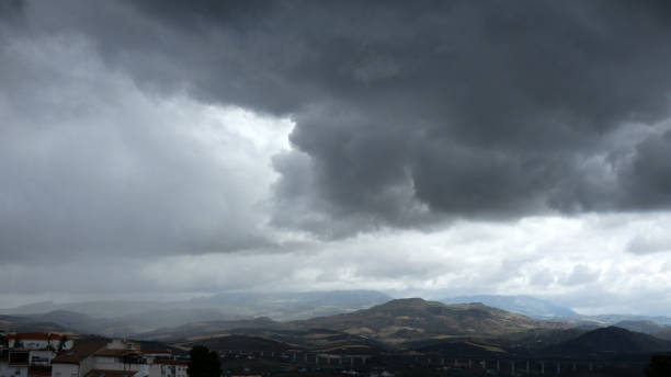 istock Havy dark clouds over Andalusian valley 1158587772