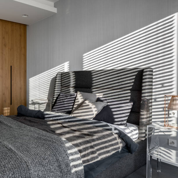istock Gray bedroom with transparent nightstand 1158592068