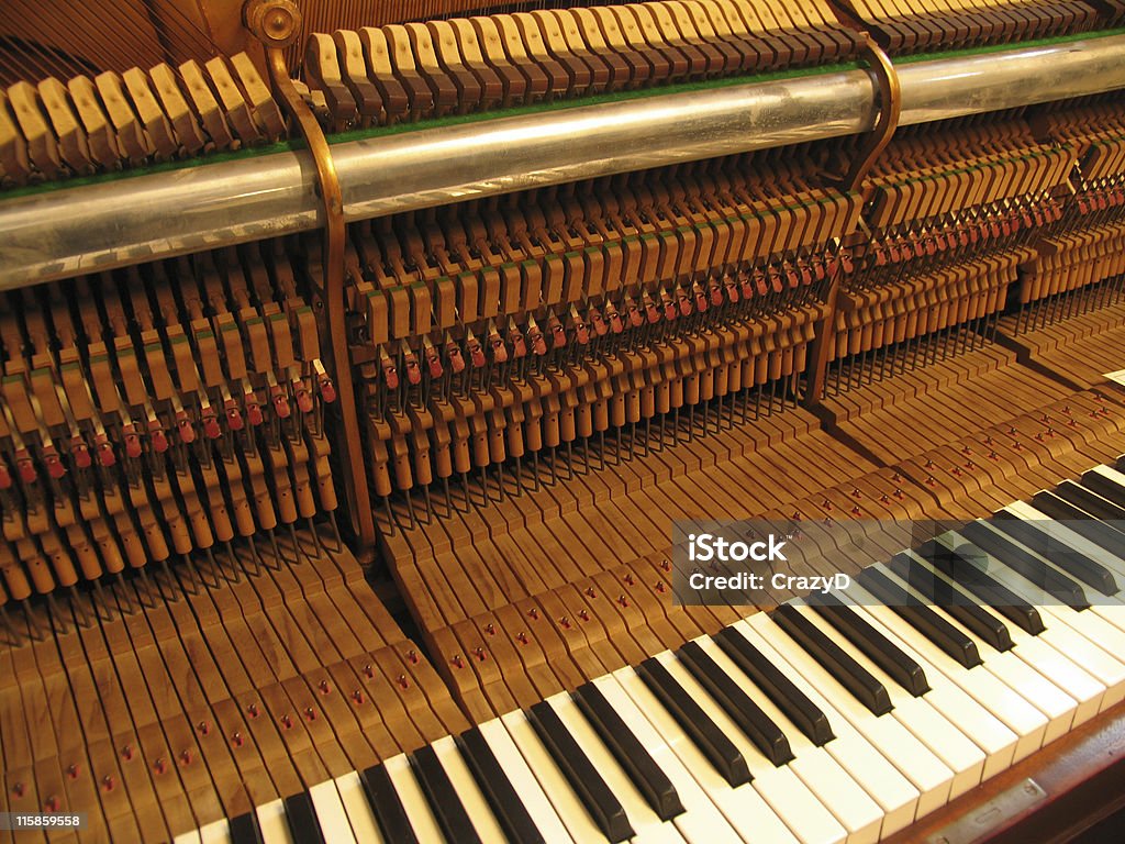 Old Piano Piano being repaired and trimmed. Color Image Stock Photo