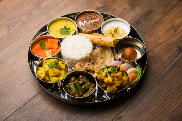 istock Indian Hindu Veg Thali / food platter, selective focus 1158599065
