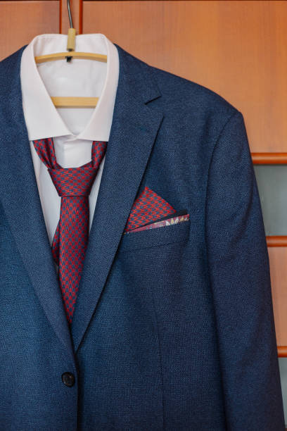 istock Stylish men's jacket hanging on a hanger 1158600500