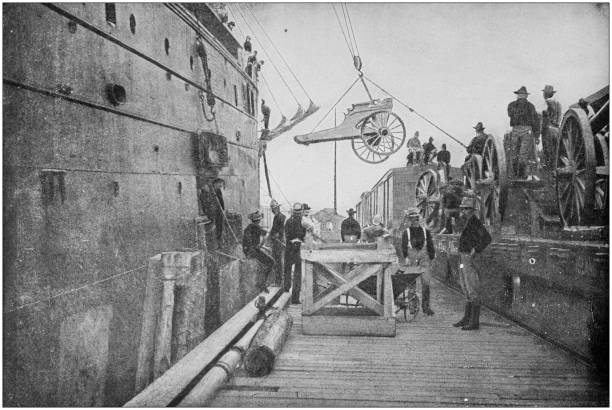 istock US Army black and white photos: loading weapon waiting for embarking for Cuba 1158600615