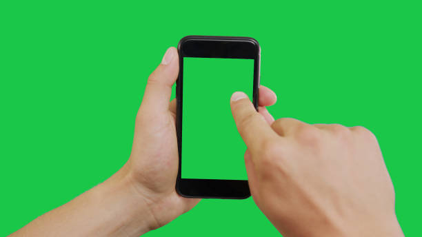 Click Smartphone Green Screen Right Click Smartphone Green Screen. Pointing Finger Clicking On Phone Screen with Green Background. Use in any project that depicts finger, gesture, touchscreen and the like. smart card stock pictures, royalty-free photos & images