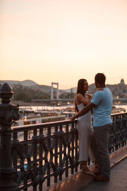 istock Couple enjoying sunset in Budapest 1158602406