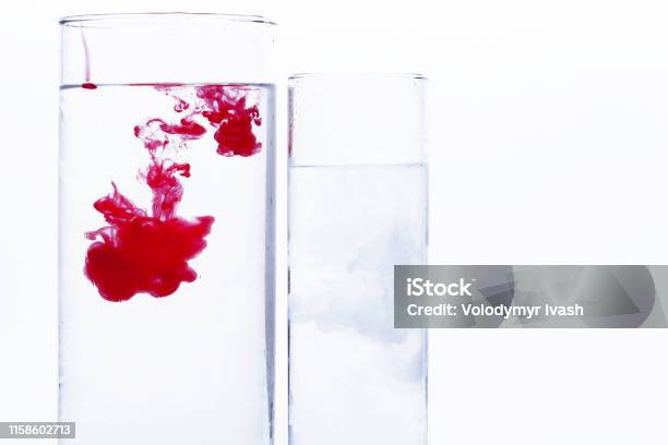 Glasses With White And Pink Paints Stand Side By Side Stock Photo - Download Image Now