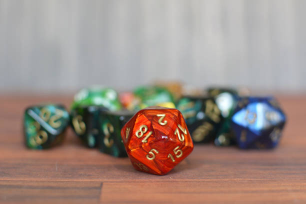 istock Colorful red, green and bue role playing dice on table with blurry background 1158605473