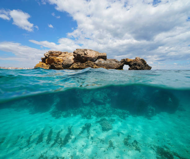 istock Rock formation split view Mediterranean sea Spain 1158606602