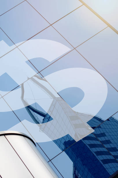 istock Modern office building with sign dollar on a background with sun 1158607134