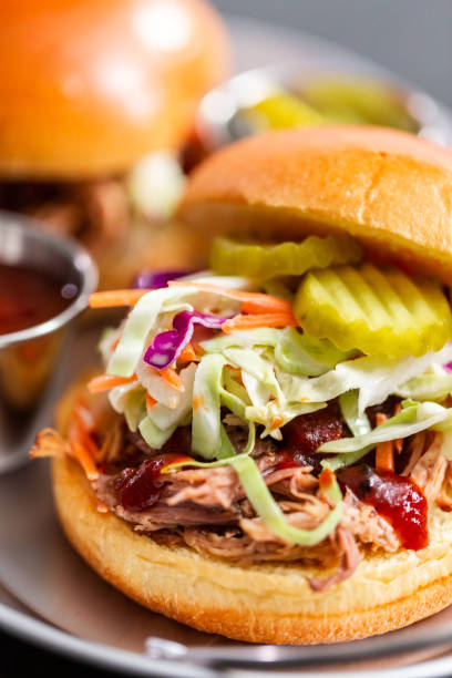 istock BBQ pulled pork sandwich with coleslaw on brioche buns. 1158608286
