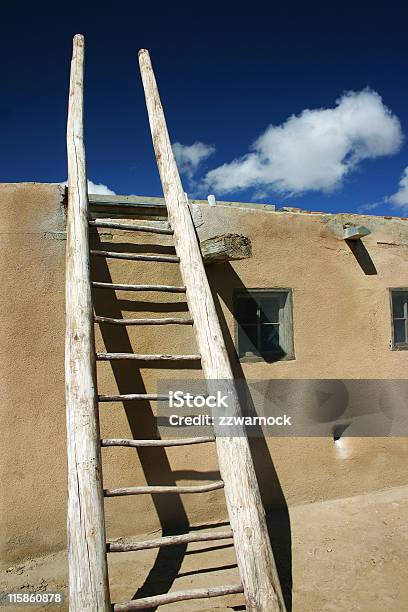 Ladder In Indian Pueblo Stock Photo - Download Image Now - Adobe - Material, Architecture, Blue