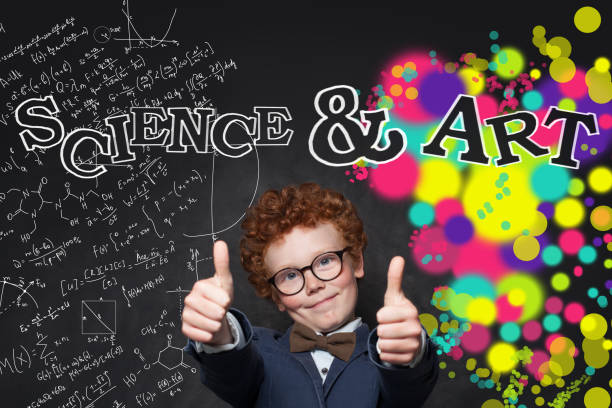 istock Happy child boy on blackboard background with science and arts pattern 1158609967