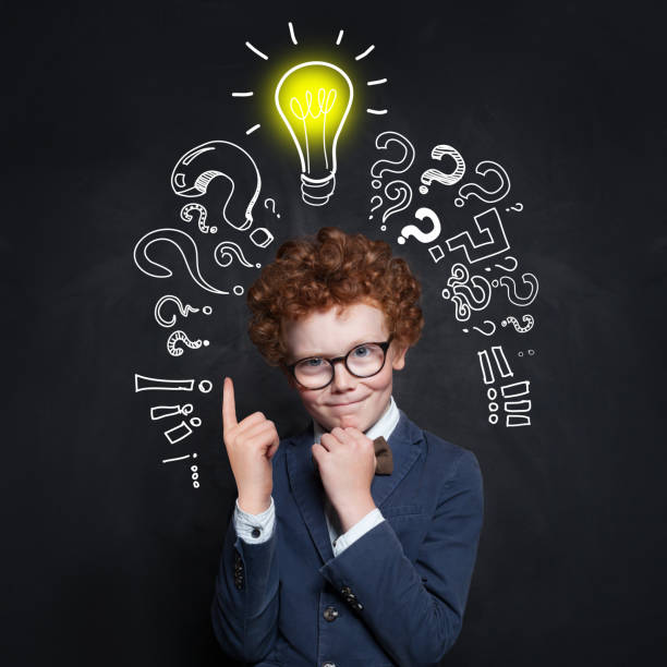istock Smart child having idea. Brainstorming and idea concept 1158609987