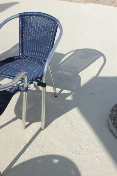 istock Rattan Sun Umbrella on swimming pool 1158610515