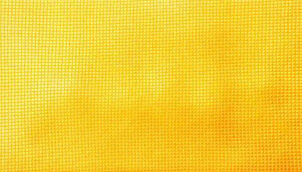 Photo of Abstract seamless yellow fabric texture background