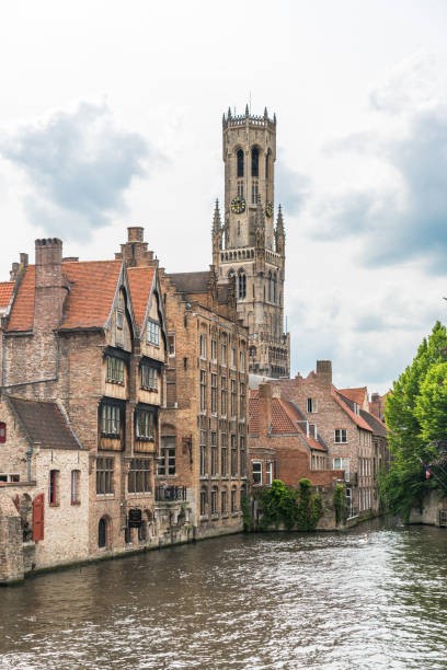 istock Rozenhoedkaai (Quai of the Rosary), and Belfry Tower, Bruges, Belgium 1158611936