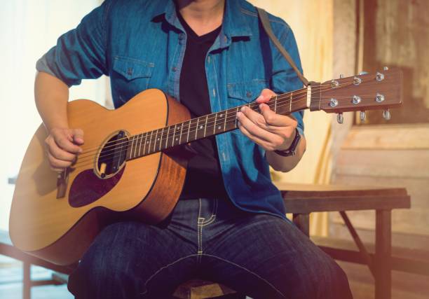 istock Close up of guitar player 1158614164