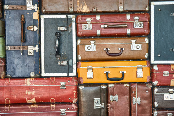 istock Suitcases for travel. Multicolored suitcases for clothes. 1158615511