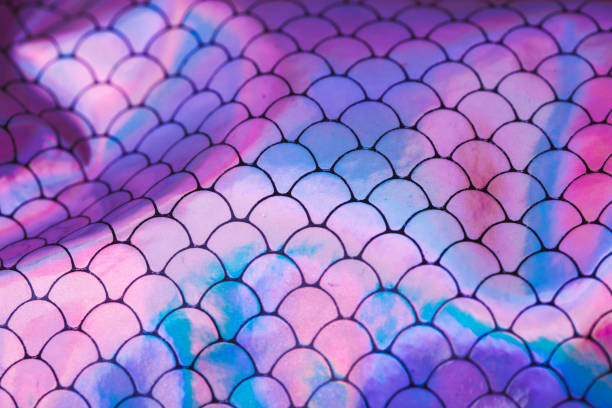 Neon holographic scales pattern. Mermaid fairy background. Close up background.