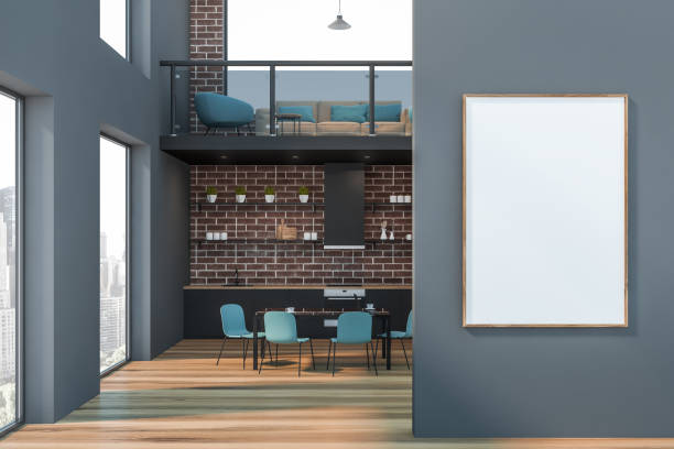 istock Gray office lounge area and kitchen with poster 1158619516