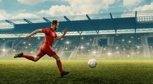 istock Soccer player in action on professional soccer stadium. 1158619653