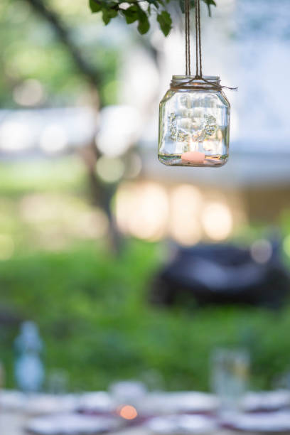 istock Hanging of the tree candle jar 1158621174