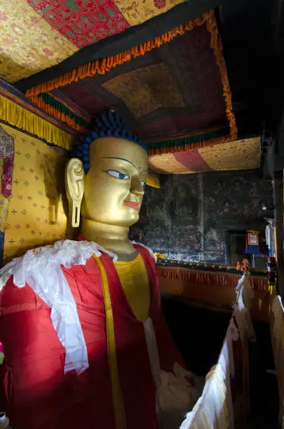 Golden statue of Shakyamuni Buddha at Shey Palace Monastery, Ladakh, India.