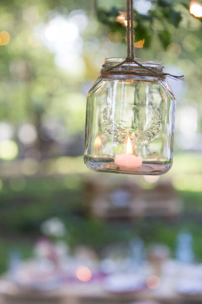 istock Hanging of the tree candle jar 1158621935