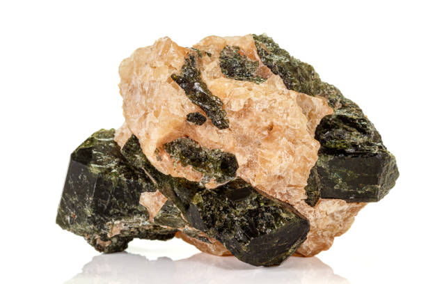 istock Macro of a mineral stone Vesuvianite on a white background 1158622341