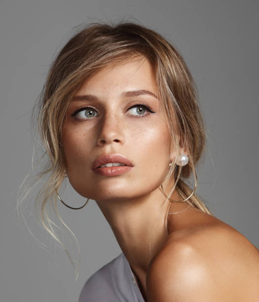 istock Beautiful woman wearing white top 1158622447