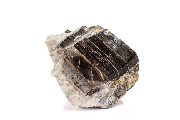 istock Macro of a mineral stone Vesuvianite on a white background 1158622614