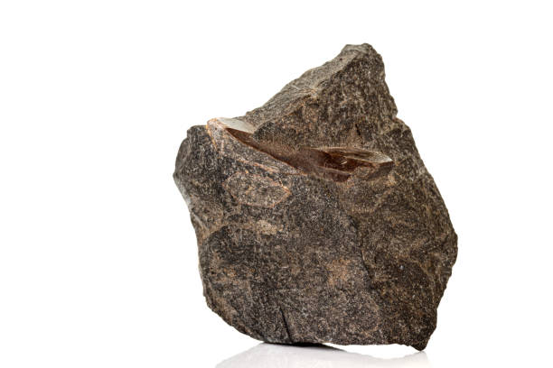 istock Macro of a mineral stone Vesuvianite on a white background 1158623407