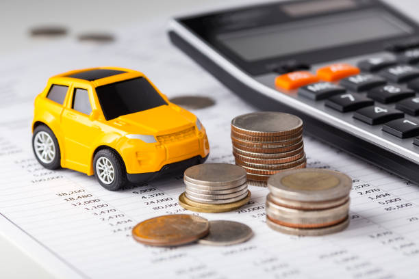 istock Car, money with calculator 1158625040