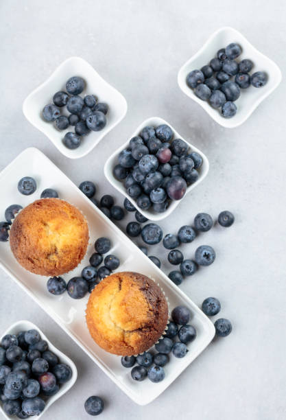 istock Muffins and blueberry on white table. 1158625056