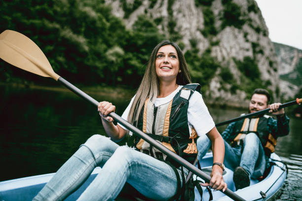 istock Cute Couple Enjoying Their Kayaking Trip 1158625432