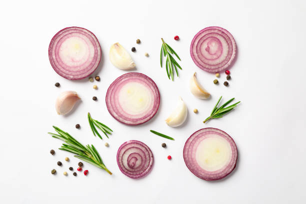 istock Flat lay composition with red onion rings and spices on white background 1158626600