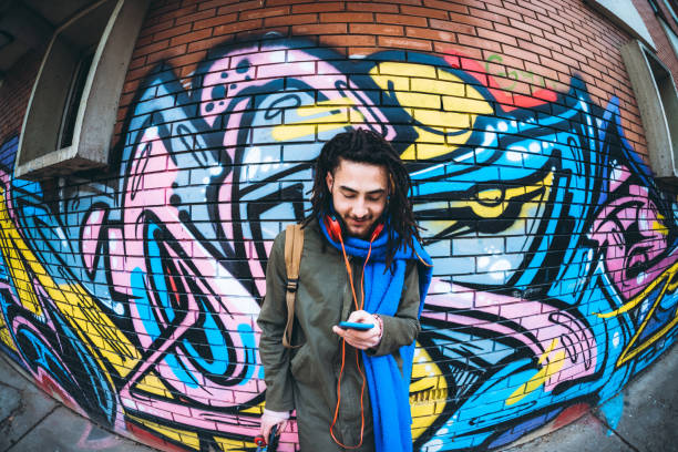 istock Young man with dreadlocks enjoys music 1158626898