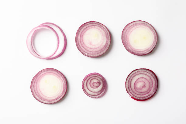 istock Flat lay composition with red onion rings on white background 1158626984