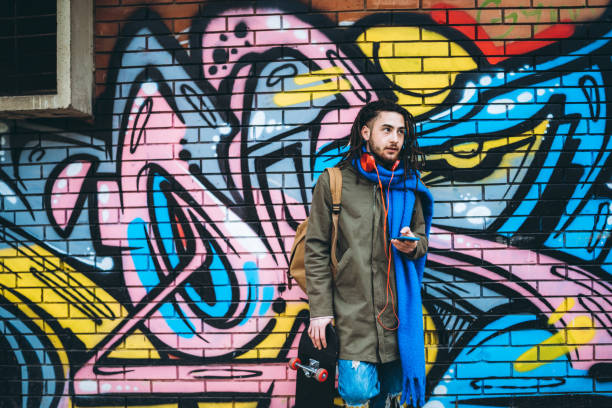 istock Young man with dreadlocks enjoys music 1158626987