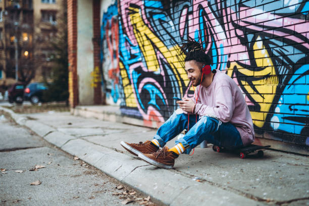 istock Graffiti artist listens to music 1158628529